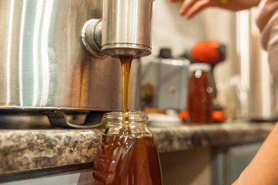 Bottling raw local wildflower honey